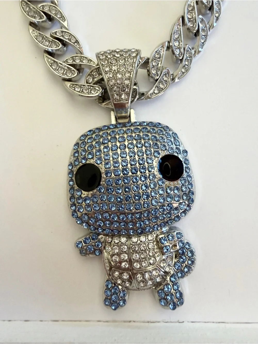 24” Iced Out Squirtle Pokémon Cuban Link Necklace 103g – White Gold Filled